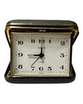 Vintage German Europa travel clock with 2 jewels, black leather case, and classic white dial with black numbers