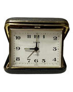 Vintage German Europa travel clock with 2 jewels, black leather case, and classic white dial with black numbers