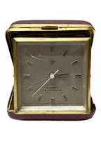 Vintage Shanghai China clock with 15 jewels, gold-tone frame, and classic square face in protective case