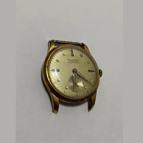 Vintage Relotex Ancre 17 Rubis wristwatch with gold-tone case and classic dial showing seconds subdial