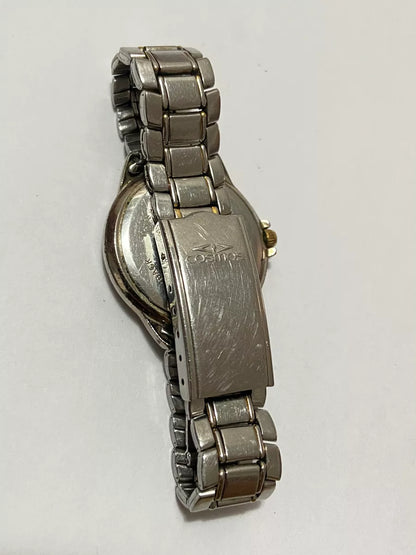 Relógio Antigo Cosmos Quartz 510am Prata E Dourado Prateado