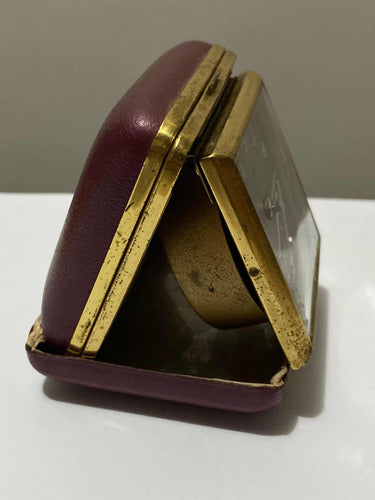 Vintage Shanghai China 15 jewels travel clock in a folding purple leather and gold-tone case, side view showing wear details